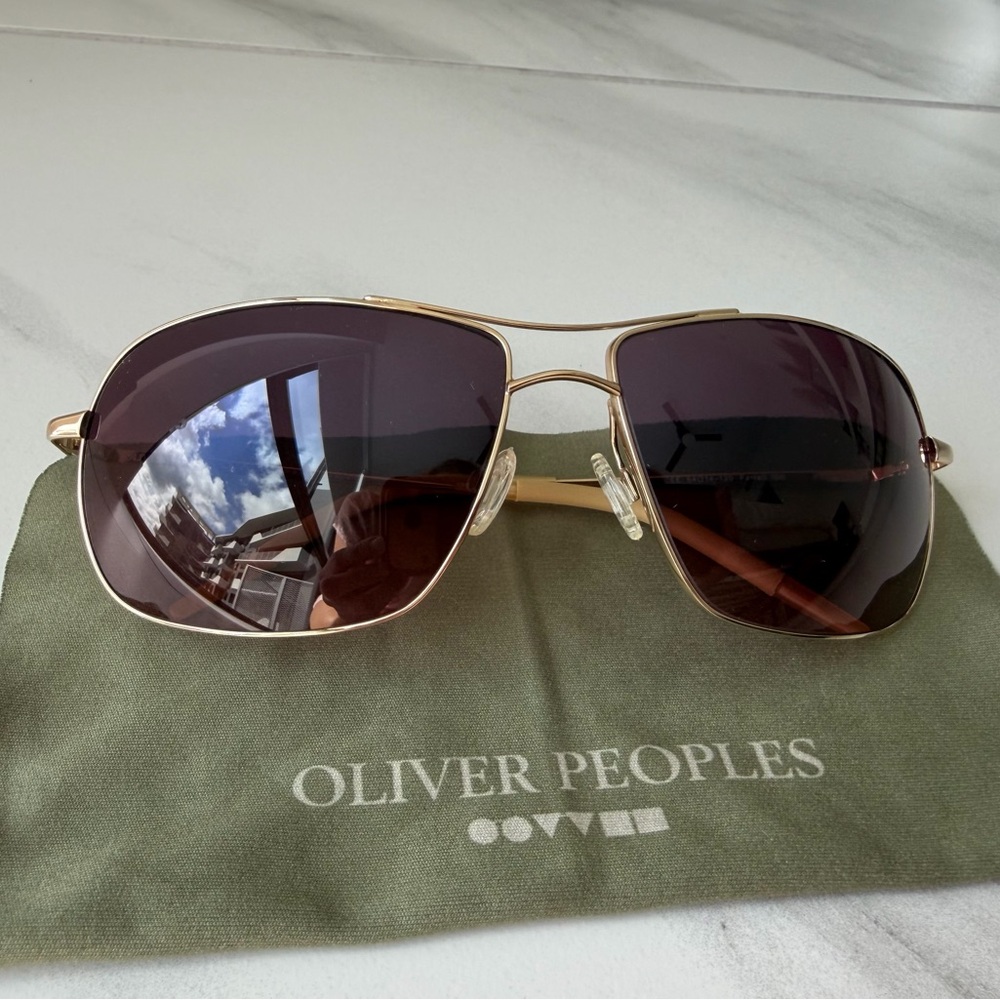 Oliver Peoples Gold Frame Sunglasses with Dark Lenses